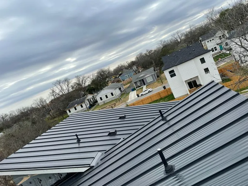 Standing seam metal roof panels with vents for Skylight Repair in Paradise Valley